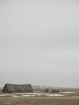 broken barn in a field