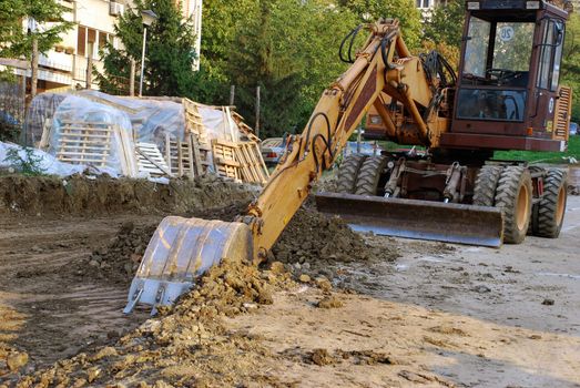 bulldozer on building site outdoor urban scene