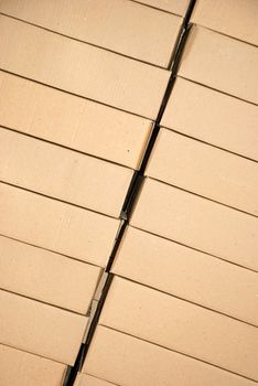 piles of paper boxes with goods in storage