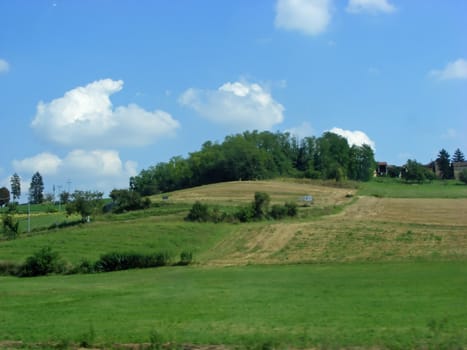 Landscape of hills with blue sky and clouds