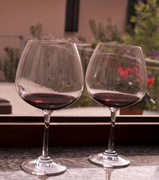 A couple of red wine glasses