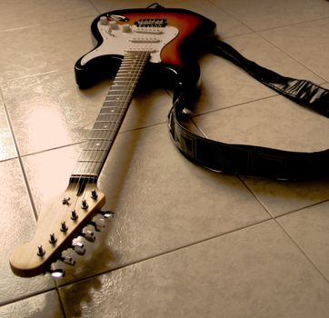 electric guitar on the floor