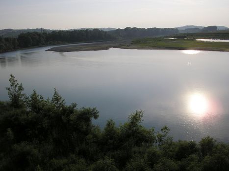 View of the river with reflections and light