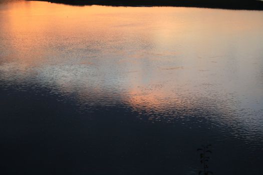 View of the river with reflections and light