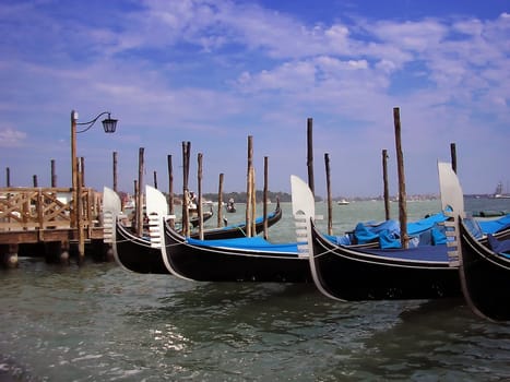 A series of gondolas in Venice         