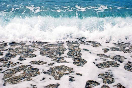 blue wave formation with foam in adriatic sea