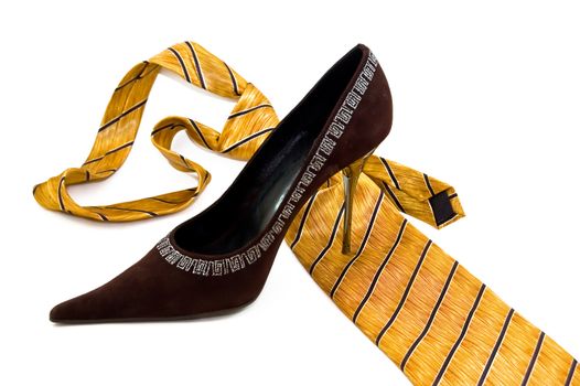 woman shoe steps man necktie, concept of emancipation