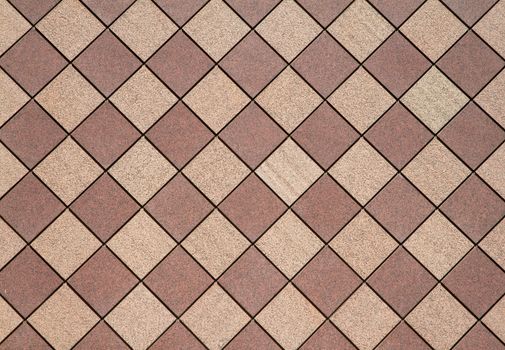 Brown and tan checkered wall in a horizontal image
