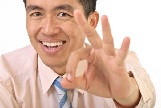 Manager show OK gesture with smiling expression, closeup portrait.