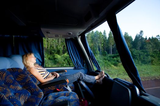 girl sleeping in a long-distance bus