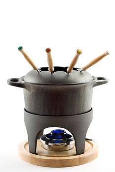 cast iron fondue set,isolated on white