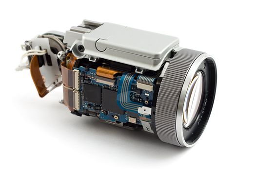 disassembled photo camera, shot on whitre