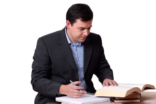 young business man reading a book on white