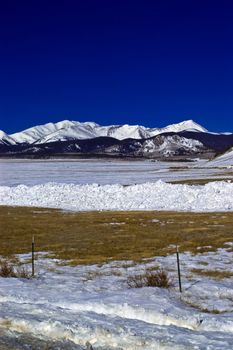 Winter among the Colorado mountains with blue skies