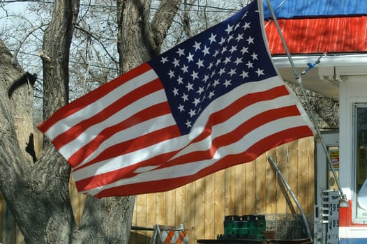 An American flag hangs blowing in the wind