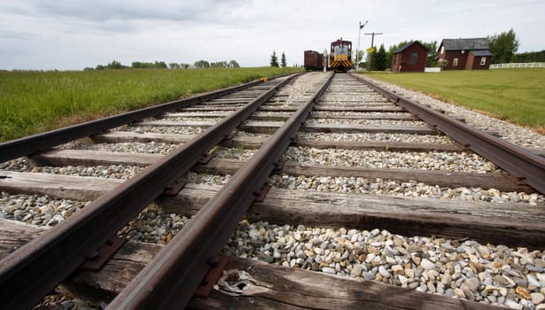 Lonely train approaching on the track