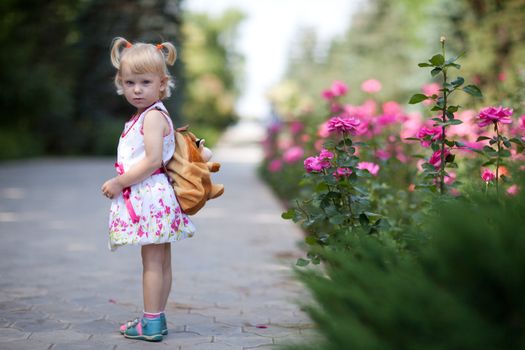 girl with bag in the park