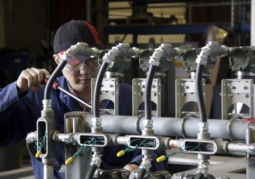 Industrial electrician at work