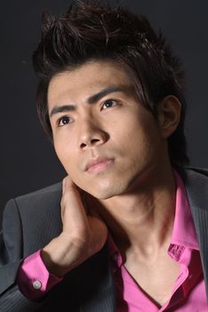 Modern young business man of Asian, closeup portrait on face.