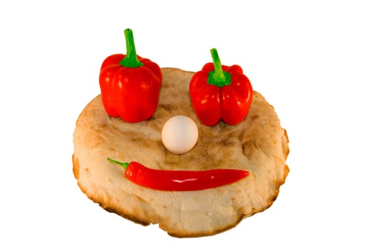 round smiling bread with vegetables and egg over white