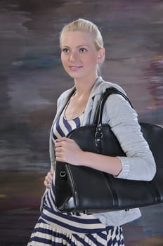 beautiful young woman 20-25 years with road bag