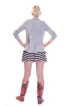 Rear view of a casually dressed young adult woman, isolated on white.