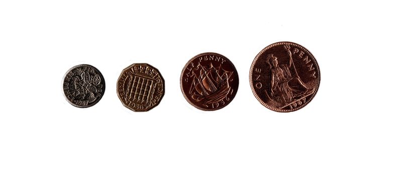An isolation of four common British coins