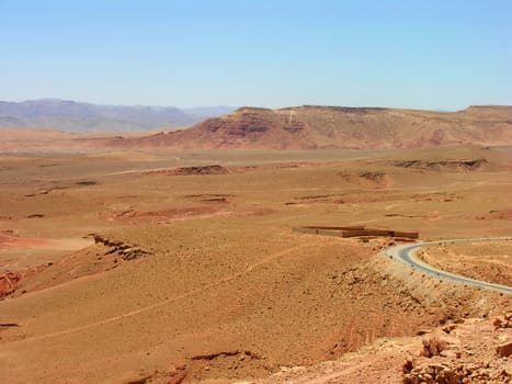 View scene of a road going to a kasbah in morocco