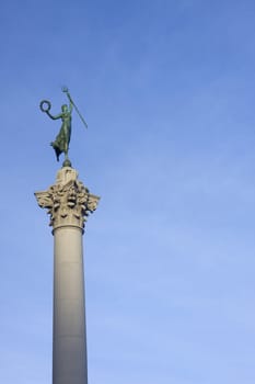 female victory statue with a trident, atop a column monument
celebrating Admiral Dewey's victory over the Spanish Navy during the Spanish-American War. San Francisco, California, USA 
