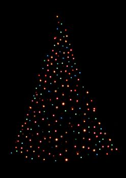 A Christmas tree shape made with christmas lights.