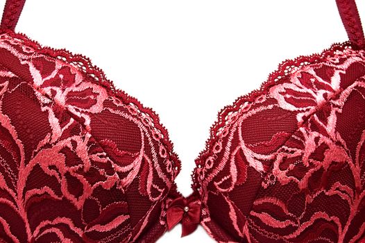 part of red lacy bra over white