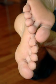 man feet crossed closeup