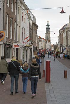 Moving crowd on city street in the Netherlands