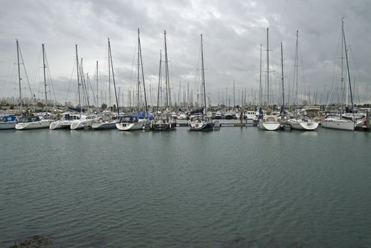 Harbor with yachts and sailboats in the Netherlands