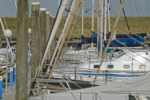 Harbor with yachts and sailboats in the Netherlands