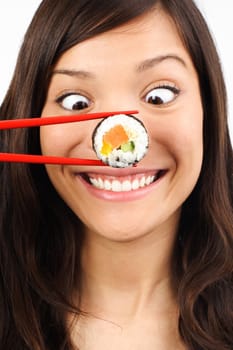 Funny picture of woman with salmon maki sushi
