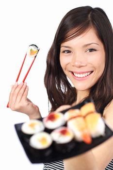 Beautiful sushi woman showing a plate of sushi. Shallow depth of field with focus on the eyes. Isolated on white.