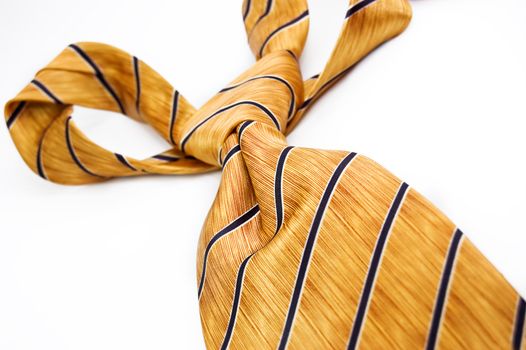 yellow striped tie isolated over white