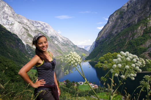 Young happy woman hiker, Sognefjorden, Norway.
