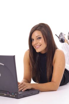happy woman checking emails on laptop vertical
