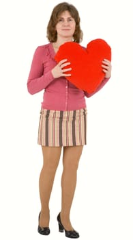 Young woman holding on hand red plush heart