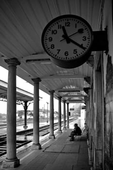 time goes by (people on the train station) (photo with grain)