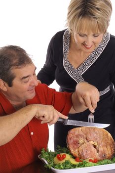 couple slicing ham vertical