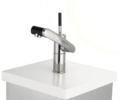 modrn dsign water faucet tap over white