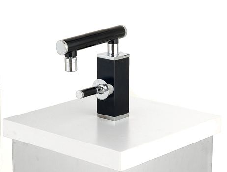 modrn dsign water faucet tap over white