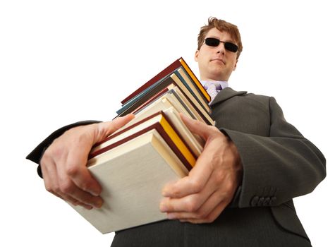 A blind man holding a stack of books
