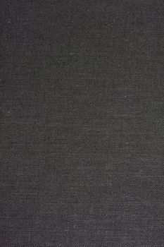 black textile background from 1960s book cover