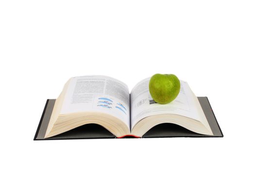 open book and green apple isolated over white