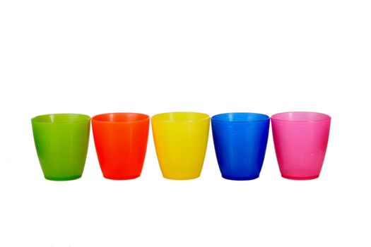 group of 5 five colored plastic cups  isolated over white