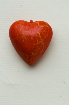 The red heart on the  white background